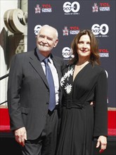 James Bond 60th anniversary celebration. Producers Michael G. Wilson and Barbara Broccoli place