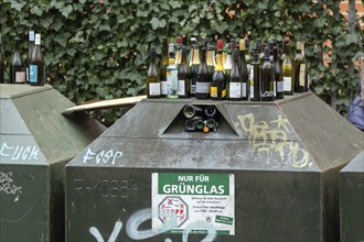 An overfilled container for glass bottles, Hamburg, Hamburg, Federal Republic of Germany