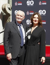 James Bond 60th anniversary celebration. Producers Michael G. Wilson and Barbara Broccoli place