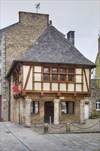 Street with half-timbered houses in Dinan city center, Brittany, France, Europe