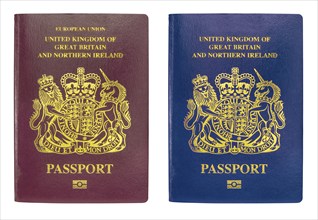 The Old Burgundy British Passport And The New Blue One Introduced After Brexit, Isolated On A White