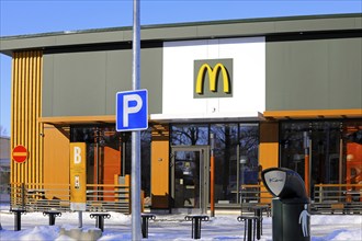 McDonalds fast food restaurant in Salo, Finland. March 12, 2023. McDonald's is the world's largest