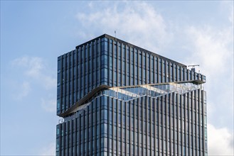 Amsterdam, Netherlands, May 7, 2022: Low angle view of futuristic architecture skyscraper against