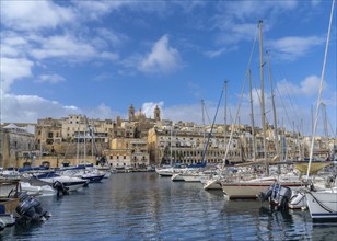 Valletta, Malta, 23 December, 2023: many boats in the Grand Harbor of Valletta with the city of