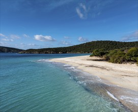 A view of the beautiful wihtie sand beach and turquoise waters at Turredda Beach in Sardinia