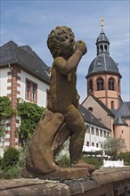 Figure sculpture statue in the monastery garden of St. Marcellinus and Peter in Seligenstadt,