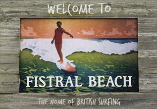 Newquay, United Kingdom, 4 Spetember, 2022: close-up view of painted wooden sign at Fistral Beach