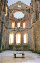 Photo shoot of the famous roofless church of San Galgano in the lands near Siena Italy