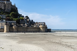 Mont Saint Michel, France, July 25, 2018: View of Mont Saint-Michel at low tide against sky, Europe