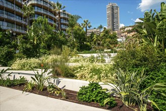 Amazing Gardening next to famous casino Monte Carlo in distance, Blurred motion people and