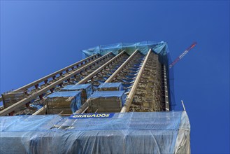 Madrid, Spain, February 14, 2021: Low angle view of Colon Towers under renovation. Nearly Zero