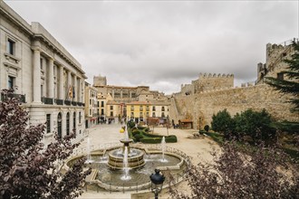 Avila, Spain, November 11, 2014: The Medieval Walls of Avila, cathedral and square. The old city