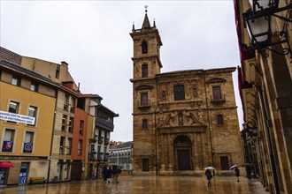 Oviedo, Spain, March 27, 2024: Cityscape of Oviedo a rainy spring day. Constitution Square, Europe