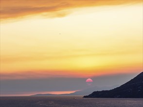 Cloudy mood at sunset by the sea, view from the bell tower, near Korcula, Korcula Island, Dalmatia,