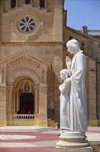 Marble statue of Mother and Child in front of the Basilica of the National Shrine of the Blessed