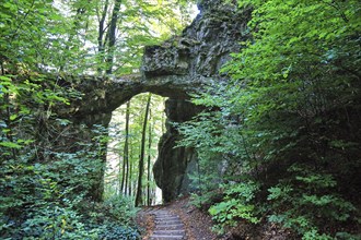 The rock castle near Emmendorf is a naturally formed natural stone arch. The rock formation was