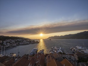 Evening atmosphere in front of sunset, view from the bell tower, Korcula harbour, Korcula island,