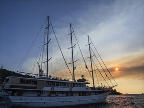 Evening atmosphere in front of sunset, sailing yacht, harbour of Korcula, island of Korcula,