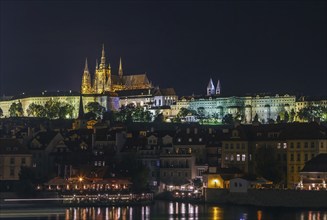 View of Prague castle from Vltava river in evening, Czech republic