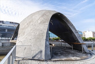 Madrid, Spain, December 9, 2019: Modern concrete bridge over Manzanares River in Madrid RIo area,
