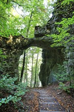 The rock castle near Emmendorf is a naturally formed natural stone arch. The rock formation was