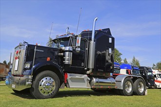 PORVOO, FINLAND, JULY 2, 2016: Dark blue Kenworth W900 truck tractor year 1982 on display on