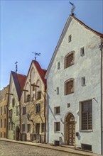 Street with historical houses in Tallinn old town, Estonia, Europe