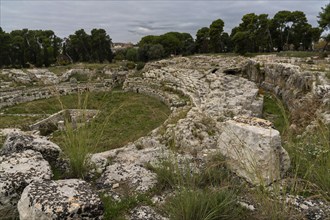 Syracuse, Italy, 28 December, 2023: view of the ruins of the historic Roman amphitheater in