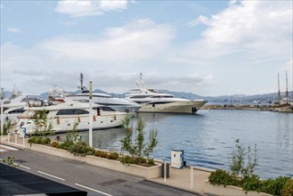 Idyllic view on Motor Yachts (nautical vessels) in harbor on French Riviera (Cote D'Azur) at sunny