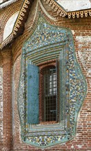 Tile platband at a window of the central apse of an altar of Church of Saint John Chrysostom in