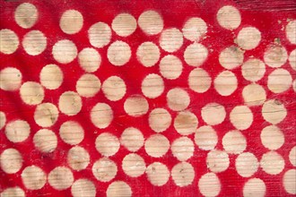 Background wooden base with colored circles of red color