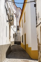 Scenic view of the old town of Elvas in Alentejo, Portugal. Narrow streets of whitewashed white