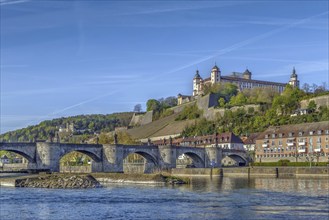 View of Marienberg Fortress with Alte Mainbrucke from main river, Wurzburg, Germany, Europe