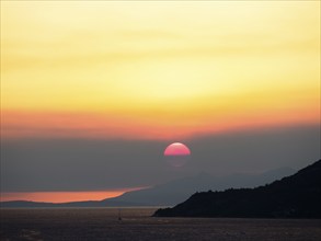 Cloudy mood at sunset by the sea, view from the bell tower, near Korcula, Korcula Island, Dalmatia,