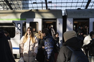 10.03.2022, Berlin, Germany, Europe, War refugees from Ukraine get off a train from Warsaw on their