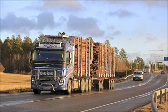 KAARINA, FINLAND, DECEMBER 5, 2016: Blue Volvo FH16 of Vuotila Oy for wood transport on the road