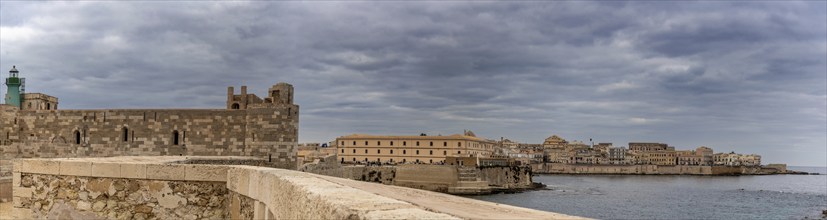 Syracuse, Italy, 28 December, 2023:panorama view of the Maniace Castle and Isola di Ortigia in