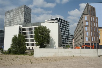 11.06.2019, Berlin, Germany, Europe, New office buildings and a building plot for commercial