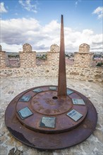 Avila, Spain, November 11, 2014: Metal Sundial in The Medieval Walls of Avila. The old city and its