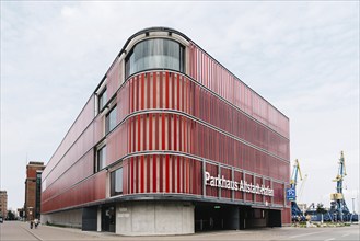 Wismar, Germany, August 1, 2019: Modern architecture multi storey car park in the harbour of