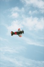 Old Russian Fighter Plane from Spanish Civil War Flying against Blue Sky. Policarpov I-16