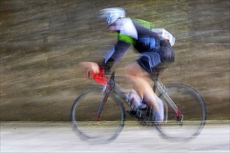 Photo with blur on a competitive road bike race