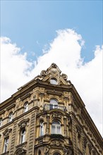 Old residential buildings in Prague against sky