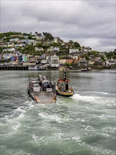 Dartmouth, Devon, England, UK, May 26, 2022: The Lower Ferry crosses the River Dart on its way to