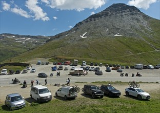 Car park with cars at the top of the Furka Pass, Goms, Valais, Switzerland, Europe