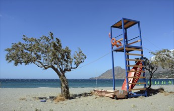 Tamarisk and rescue tower on the beach, Plakias, Crete, Greece, Europe