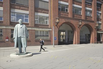 Monument and statue to Adam Opel 1837-1895 in front of the main portal, Adam Open AG, Rüsselsheim,