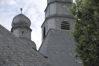 Towers with slate roof of Gustav Adolf Church, Gustavsburg, Hesse, Germany, Europe