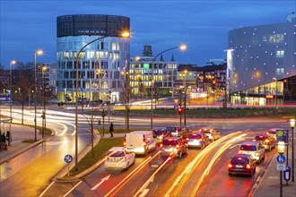 Evening city centre traffic in Essen, large intersection, roundabout, Berliner Platz, this area