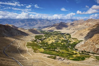 View of green Indus valley from ascend to Kardung La pass, - allegedly the highest motorable pass